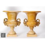 A pair of late 19th Century French yellow and white marble gilt mounted campana shape terrace