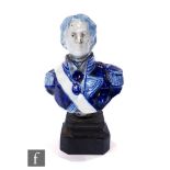 A 19th Century Continental Delft bust of Admiral Lord Nelson in full military uniform, raised to a