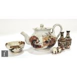 A collection of 19th to 20th Century Japanese ceramics to include a samurai design teapot, two