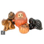 A collection of 19th to 20th Century carved hardwood netsuke to include a Daruma (lacking protruding