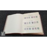 A GB stamp album containing various mounted mint and used issues to include 1924-25 British Empire