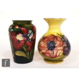 A Moorcroft Pottery vase decorated in the Frilled Orchid pattern with tubelined flowers against a