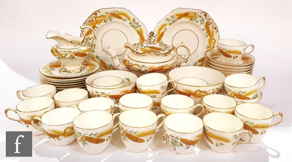 A late 19th Century Copeland breakfast set comprising teapot and stand, twelve teacups and