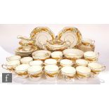 A late 19th Century Copeland breakfast set comprising teapot and stand, twelve teacups and