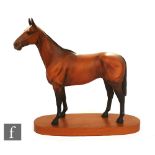A Beswick horse, Arkle Champion Steeplechaser shield mark, with plinth, 28cm.