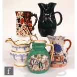 An assorted group of 19th Century jugs to include a Masons Ironstone example with Lamprey handle and