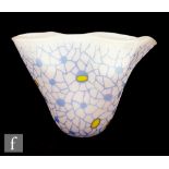 A contemporary art glass vase of handkerchief form, the white frosted glass with blue spots and
