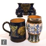 Five assorted items by Royal Doulton to include a waisted vase with white metal collar, decorated