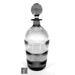 A 1940s crystal glass decanter designed by Elis Bergh for Kosta of tapering ribbed optic form