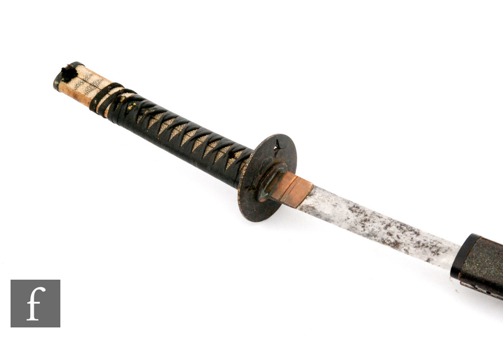 A late 19th to early 20th Century Japanese katana with ray skin handle, pierced tsuba, signed tang
