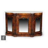 A Victorian inlaid walnut credenza with mirror panelled doors, floral inlaid frieze on a plinth,