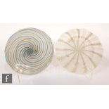 Two Italian Murano glass plates, the first with a lattachino spiral lane in alternating white,
