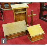 A small 20th Century oak table/lecturn with lunette and carved arch detail, two similar bible or