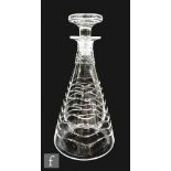 A 1930s Webb Corbett clear cut crystal decanter of tall conical form with flat stopper cut with