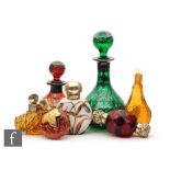 A collection of seven assorted late 19th and early 20th Century glass scent bottles of varying