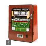 A 1970s wall mounted Greyhound Stadium penny slot machine, height 68cm, with key.