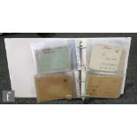 A white ring binder album containing sixty Second World War German soldiers 'Feldpost' covers,