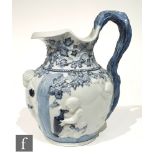 A late 19th Century Copeland 'Spode's Florentine' water jug decorated with relief moulded