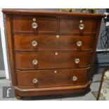 A Victorian mahogany chest of two short and three long drawers, fitted with glass handles on