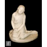 A 19th Century carved Italian marble figure of a seated young classical maiden of a young girl