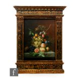 AFTER JAN VAN HUYSUM - A still life composition with grapes, pomegranate, peaches and plums in a