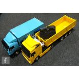 Two 1:14 scale radio control models, the first composed of a Tamiya 56312 Volvo FH12 Globetrotter