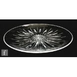 A large post war Stuart & Sons clear crystal plate, possibly John Luxton, with star cut base and a
