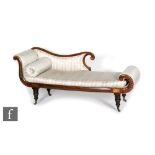 A William IV mahogany chaise longue with scroll ends, the exposed frame detailed with rosewood