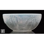 A Czechoslovakian Barolac bowl with a relief moulded palm tree pattern, all in a graduated