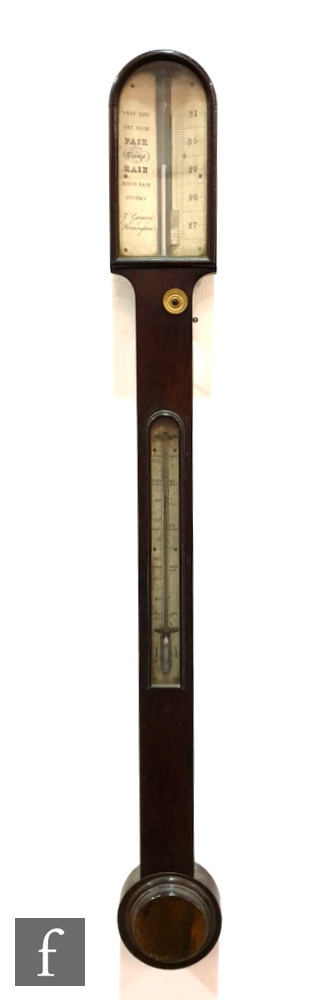 A George III rosewood stick barometer, the arched top incorporating a silver scale signed F