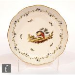 A late 18th to early 19th Century Loosdrecht Amstel porcelain shallow plate decorated with a hand