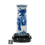 A Chinese 19th Century blue and white sleeve vase, of small proportions, the white ground detailed