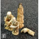 A 19th Century carved ivory seated figure of a man mixing tea with a stick, another of a scribe, a
