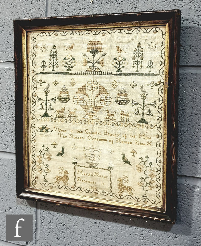 An early 19th century sampler depicting stylized flowers, birds and animals within a wavy border,