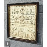 An early 19th century sampler depicting stylized flowers, birds and animals within a wavy border,