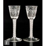 A pair of 19th Century wine glasses in the 18th Century style, each with round funnel bowl