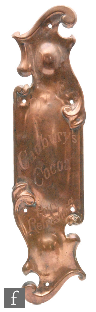 An early 20th Century shaped copper advertising finger or door plate engraved with the slogan 'Drink