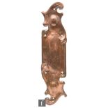 An early 20th Century shaped copper advertising finger or door plate engraved with the slogan 'Drink