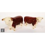 A Beswick Hereford cow, model 1360 and a Beswick Hereford bull, model 1363B, both Ch. of