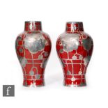 A pair of early 20th Century Bernard Moore flambe vases of inverted baluster form, both with a