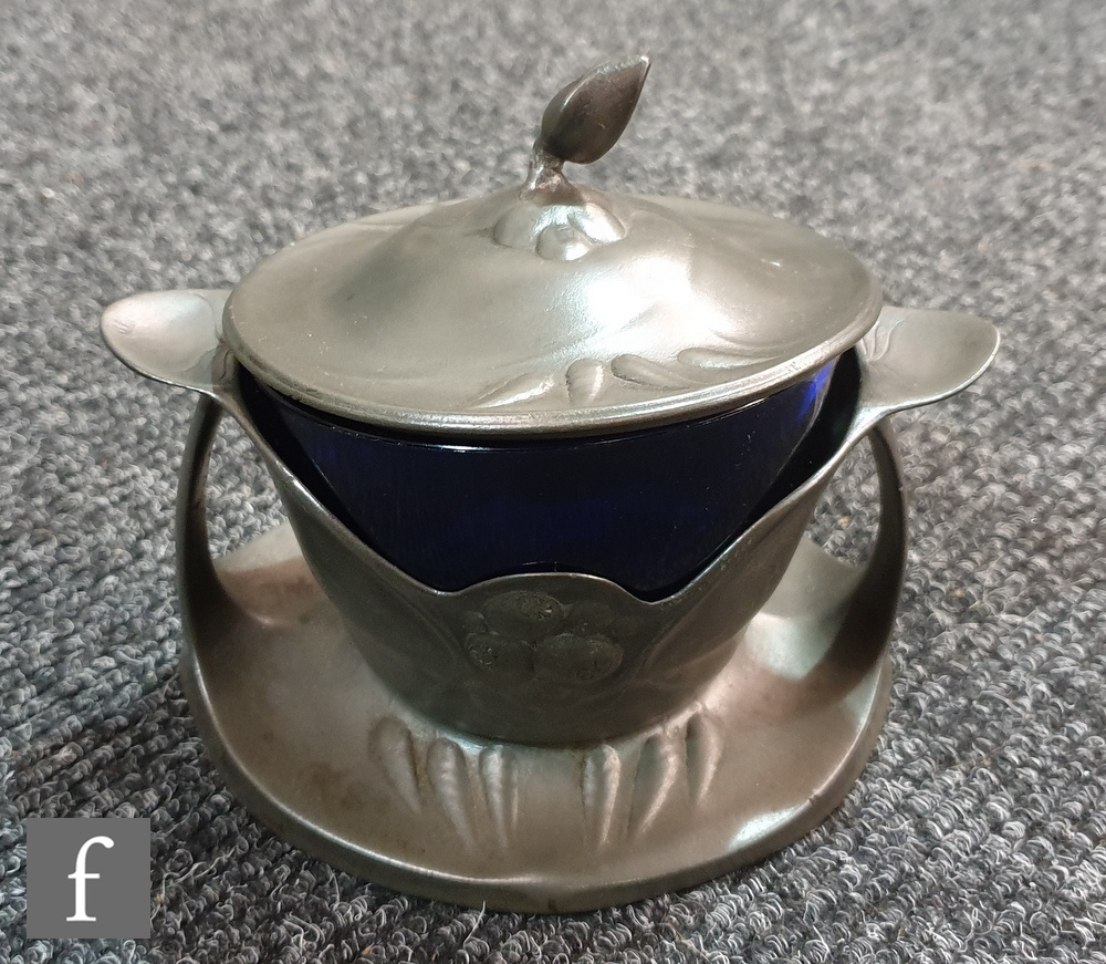 A Kayserzinn Art Nouveau secessionist pewter preserve pot detailed in relief with fruit, with