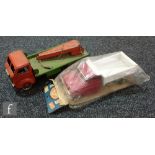 An Arkin Toys, Japan, tinplate friction drive tipper lorry contained in original bag with header