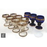 Ten Austrian Moser drinking glasses, seven clear and three blue, each with a cup shaped bowl