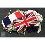 A quantity of assorted 1950s and later stitched line flags, naval pennants, bunting for various