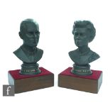 A boxed pair of Royal Doulton black basalt busts of Queen Elizabeth II and Prince Philip, made to
