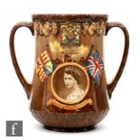 A large Royal Doulton twin handled commemorative loving cup for The Coronation of Queen Elizabeth