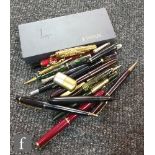 A Parker Junior fountain pen with various other assorted pens, propelling pencils and