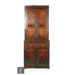 A George III North Wales oak bread and cheese cupboard (cwpwrdd bara caws) of two piece