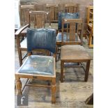 A set of five 1930s oak dining chairs each with plank seats on block legs and a pair of chairs