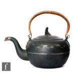 A 19th Century black basalt tea kettle, probably Wedgwood, decorated with a hand painted silver